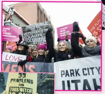  ??  ?? Charlize Theron (right) leads the women’s march in Park City, Utah, where the Sundance Film Festival takes place. Also there are comedienne Chelsea Handler (in pink beanie) and Jennifer Beals (carrying the “Love” sign).
