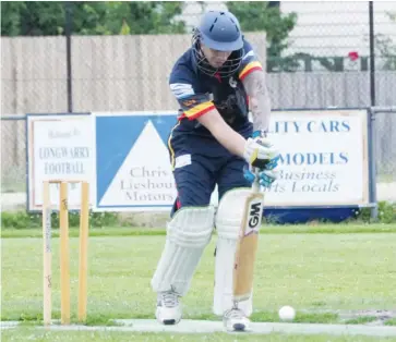  ??  ?? Longwarry’s DylanSeron­g defends during the division one loss to ladder leaders Buln Buln.