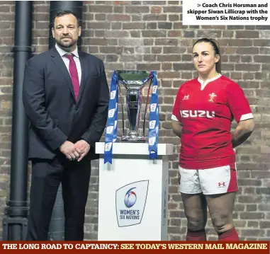  ??  ?? > Coach Chris Horsman and skipper Siwan Lillicrap with the Women’s Six Nations trophy