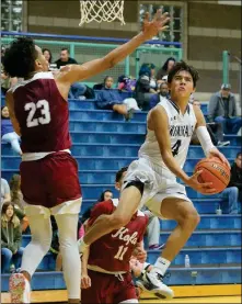  ??  ?? ABOVE: YUMA HIGH’S ALEX MOSQUEDA (RIGHT) takes the ball to the hoop while Kofa’s Stone Braveheart (23) defends during the second quarter of Wednesday night’s game at The Palace at Prison Hill. LEFT: Yuma High’s Zach Moody (3) tries to take the ball to the hoop between Kofa’s Isaiah Brown (behind) and Alfredo Carbajal (right) during the second quarter of Wednesday night’s game at The Palace at Prison Hill.