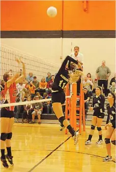  ?? Staff photograph by Randy Moll ?? Lady Blackhawk Mikhaela Cochran, a junior, leaps for the ball during a recent game at Gravette. The Lady ’Hawks were the top seed and scheduled to play Tuesday, Oct. 22, in the 4A-Northwest Volleyball Tournament in Farmington.