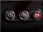  ??  ?? JE’S electronic handbrake controls, using chrome buttons instead of rocker switch