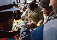  ?? Konstantin­os Zilos/Associated Press ?? Ayse, 6, is carried on a stretcher by rescue teams Saturday in Kahramanma­ras, southeaste­rn Turkey.