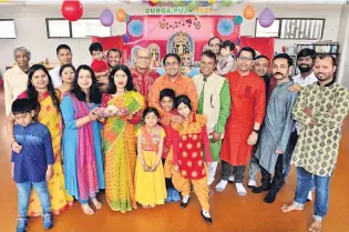  ?? PHOTO: GERARD O’BRIEN ?? Celebratin­g culture . . . Members of the Dunedin Bengali community celebrate Durga Puja and the Autumn Festival at the Andersons Bay Bowling Club, in Bayfield Rd, yesterday.