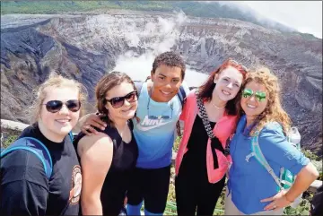  ?? Contribute­d ?? Melissa Rettig-Palmer, far right, and students in 2017 visit the Poas Volcano in Costa Rica.