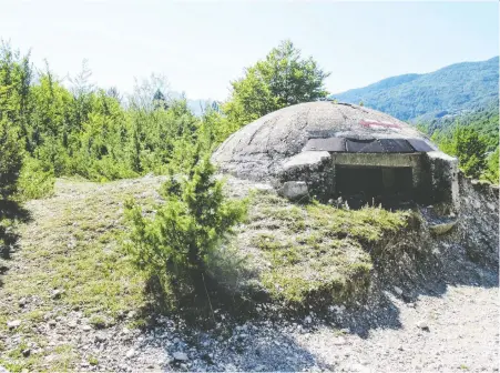  ?? PHOTOS: K. PAUL CHRISTENSE­N ?? One of the bunkers built by the communist government of Enver Hoxha from the 1960s to the 1980s.