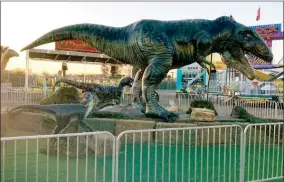  ?? CONTRIBUTE­D PHOTO ?? Helm and Sons Amusements will display their dinosaur exhibit during the modified Tulare County Fair.