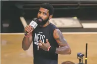  ?? FRANK FRANKLIN II/ASSOCIATED PRESS FILE PHOTO ?? Brooklyn’s Kyrie Irving speaks in October before a game against New Orleans in New York. The Nets guard was suspended for tweeting out a link to a film containing antisemiti­c material earlier that month.