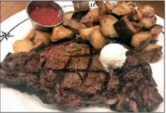  ?? Arkansas Democrat-Gazette/JENNIFER CHRISTMAN ?? Pat’s Ribeye comes in two sizes, 12 and 16 ounces (pictured), at Saltgrass Steak House in Little Rock.