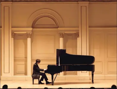  ?? ?? Danbury resident and pianist Thomas Fanelli III recently performed at the Weill Hall at Carnegie Hall in New York, N.Y., at 7 p.m., Nov. 4. Fanelli is shown performing at Carnegie Hall.