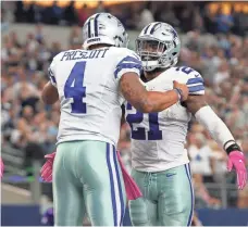  ?? MATTHEW EMMONS, USA TODAY SPORTS ?? Quarterbac­k Dak Prescott and running back Ezekiel Elliott, right, both Cowboys rookies, Tuesday were named Pro Bowlers.