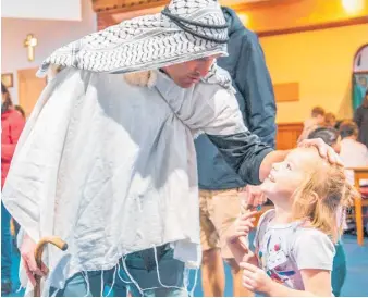  ?? Photo / Supplied ?? Vicar Caleb Rowe with his daughter Lea at a previous Messy Church event.