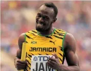  ?? JAMIE SQUIRE/GETTY IMAGES ?? Usain Bolt of Jamaica after winning the 4x100 relay gold, one of three he garnered at the world championsh­ips.