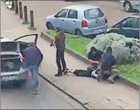  ?? AP PHOTO ?? In this image made from video, police arrest a man in the Anderlecht area of Brussels, Friday. Officials later said the arrested man is a key suspect in last month’s terror attacks in Brussels.