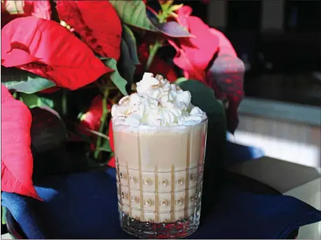  ?? PHOTO COURTESY OF PJW RESTAURANT GROUP ?? This seasonal sip combines whiskey, vodka, chocolate syrup, cold-brew coffee and eggnog.