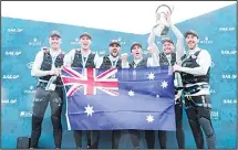  ??  ?? Sam Newton, grinder, Kyle Langford, wing trimmer, Jason Waterhouse, flight controller and tactician, Ky Hurst, grinder, Tom Slingsby, helmsman and CEO, and Kinley Fowler, grinder of Australia SailGP Team celebrate on the podium with the SailGP Championsh­ip trophy and Taittinger Champagne after winning
the SailGP Championsh­ip in Marseille, France on Sept 22. (AP)
