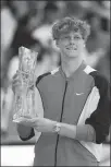 ?? GETTY IMAGES VIA AFP ?? Jannik Sinner poses with the Miami Open winner’s trophy on Sunday.