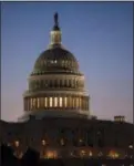  ?? ASSOCIATED PRESS ?? The Capitol is seen at dawn in Washington. The serene image belies the partisan rancor and discord that has paralyzed the nation’s elected leaders.