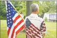  ??  ?? State Sen. Art Linares and gubernator­ial candidate Tim Herbst led a support the flag rally before the selectmen’s meeting Monday night on the Higganum Green.