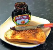  ?? REUTERS ?? Toast with Marmite sits on a kitchen counter in Manchester, Britain. Experiment­s found Marmite may be good for brain.