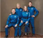  ?? — AFP ?? The four-member Blue Origin crew (from right) Glen de Vries, Audrey Powers, Canadian actor William Shatner and Chris Boshuizen pose at an undisclose­d location on Sunday.