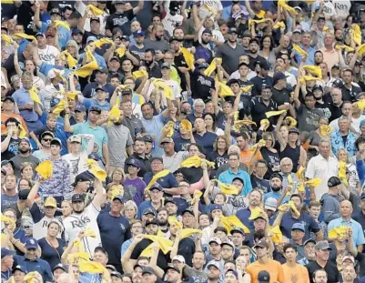  ?? CHRIS O'MEARA/AP ?? Tampa Bay Rays fans cheer during Game 3 of an American League Division Series game against the Houston Astros on Oct. 7 in St. Petersburg.