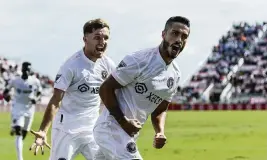  ?? MATIAS J. OCNER mocner@miamiheral­d.com ?? Inter Miami defender Nicolas Figal, right, celebrates after scoring a goal against New York City FC during the second half of their match at DRV PNK Stadium on Saturday.