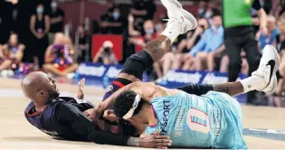  ?? PHOTO: GETTY IMAGES ?? Tony Crocker, of the Adelaide 36ers (left) and Tai Webster, of the Breakers, end up on the floor during the round two NBL match in Adelaide on Friday.