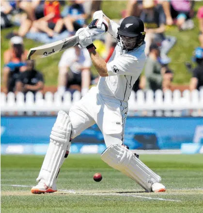  ?? Photo / AP ?? Tom Latham put together a tidy century as the Black Caps took control at the Basin.