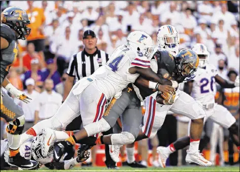  ?? GETTY IMAGES ?? Bryan Cox Jr. (94) made a name for himself with a solid SEC career for the Florida Gators. But injuries his senior season caused his NFL stock to fall. The Panthers signed Cox Jr. as an undrafted free agent last month.