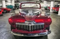  ?? PHOTOS: BRENDAN MCALEER ?? Vehicles in the Petersen Automotive Museum, clockwise from top left: round- doored 1925 Rolls- Royce; a 1952 Ferrari Bardetta, a gift to Henry Ford II from Enzo Ferrari; Saddam Hussein’s Mercedes- Benz 600 limousine; a 1948 ‘ Greased Lightning’ Ford...