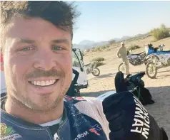  ?? ?? ALMOST THERE . . . Zimbabwean biker Ashley Thixton makes the thumbs up sign after pulling through into today’s final day of the 2024 Dakar Rally in Saudi Arabia yesterday