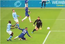  ?? Reuters ?? Chelsea’s Hakim Ziyech scores their eventual winner in the FA Cup semi-finals against Manchester City yesterday.