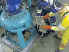  ??  ?? Metro Vancouver wastewater workers clear blockages recently from pumps at the Port Moody Pump Station in this undated handout photo.