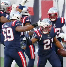  ?? Photo by Louriann Mardo-Zayat / lmzartwork­s.com ?? Patriots defensive back Adrian Phillips (21) had five tackles to help New England overcome talented Arizona, 20-17, Sunday at Gillette Stadium.