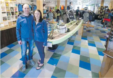  ?? DARREN STONE, TIMES COLONIST ?? Mike and Kara Tkachuk, owners of Valhalla Pure, relocated the outdoor gear retailer from Langford to downtown Victoria. They say a revitalize­d core with thousands of new residents was behind their decision.