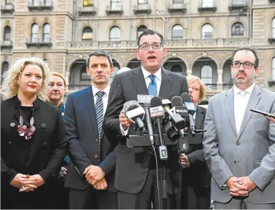  ??  ?? Victorian premier Daniel Andrews (centre) fronts a press conference to announce proposed mandatory sentencing reforms with (from left) Jill Hennessy, Wayne Gatt and Martin Pakula.