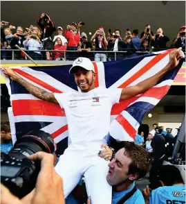  ?? Foto: LEHtIKuVA/CLIVE MASoN ?? Lewis Hamilton firade redan VM-titeln.