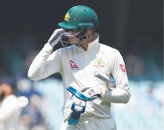  ?? Picture: AAP ?? Australian batsman Peter Handscomb departs after being dismissed by James Anderson for 12 in the second Ashes Test in Adelaide.