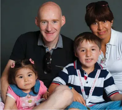  ??  ?? ‘Very distressed’: Nanci Martin with her husband Ruary, son and daughter Milagros, who developed cerebral palsy due to issues with her birth