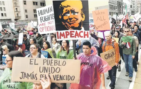  ?? — AFP photo ?? File photo shows demonstrat­ors march to protest Trump’s immigratio­n policies during the ‘Immigrants Make America Great March’ in Los Angeles, California.