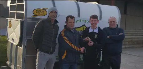  ??  ?? Chris Creedon is presented with the sheep trailer he won in the Gneeveguil­la GAA fundraisin­g draw. From left, are Liam Murphy, Patrick Barry, Chris Creedon and Tom Kerins