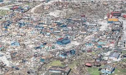  ?? ADAM DELGIUDICE AFP/GETTY IMAGES ?? Hurricane Dorian caused great damage to Freeport on Grand Bahama Island, the hometown of Blue Jays farmhand Chavez Young.