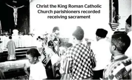  ?? ?? Christ the King Roman Catholic Church parishione­rs recorded receiving sacrament
