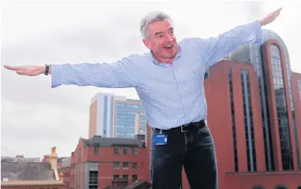  ?? KEVIN SCOTT ?? Flying high:
Ryanair boss Michael O’leary before a 2016 press conference in Belfast