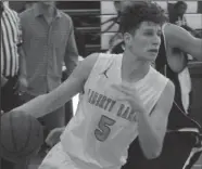  ?? MIKE BUSH/NEWS-SENTINEL ?? Liberty Ranch forward Jayden Baroni drives around a West Campus player in Saturday's game at the 16th annual St. Hope Elite Hoop Classic at Sacramento High.