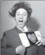  ??  ?? STAR: Sir Ken Dodd with a Variety Club Show Business Personalit­y of the Year award in 1966.