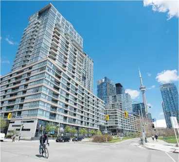  ?? PETER J. THOMPSON / NATIONAL POST ?? As the cost to own a home has increased steadily over the years, particular­ly in cities such as Toronto, so too has the percentage of people opting to rent instead of buy.