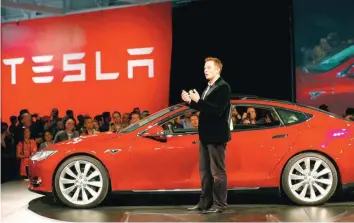  ?? — Reuters ?? Tesla CEO Elon Musk speaks during the delivery of Tesla Model 3 vehicles in Fremont, California, in this file photo.