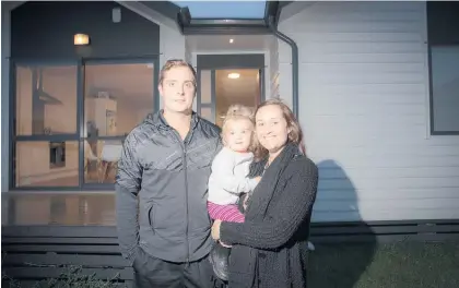  ?? Picture / Michael Craig ?? Brenton and Renee Moyes with daughter Harper are paying $650,000 for their Glen Innes house.